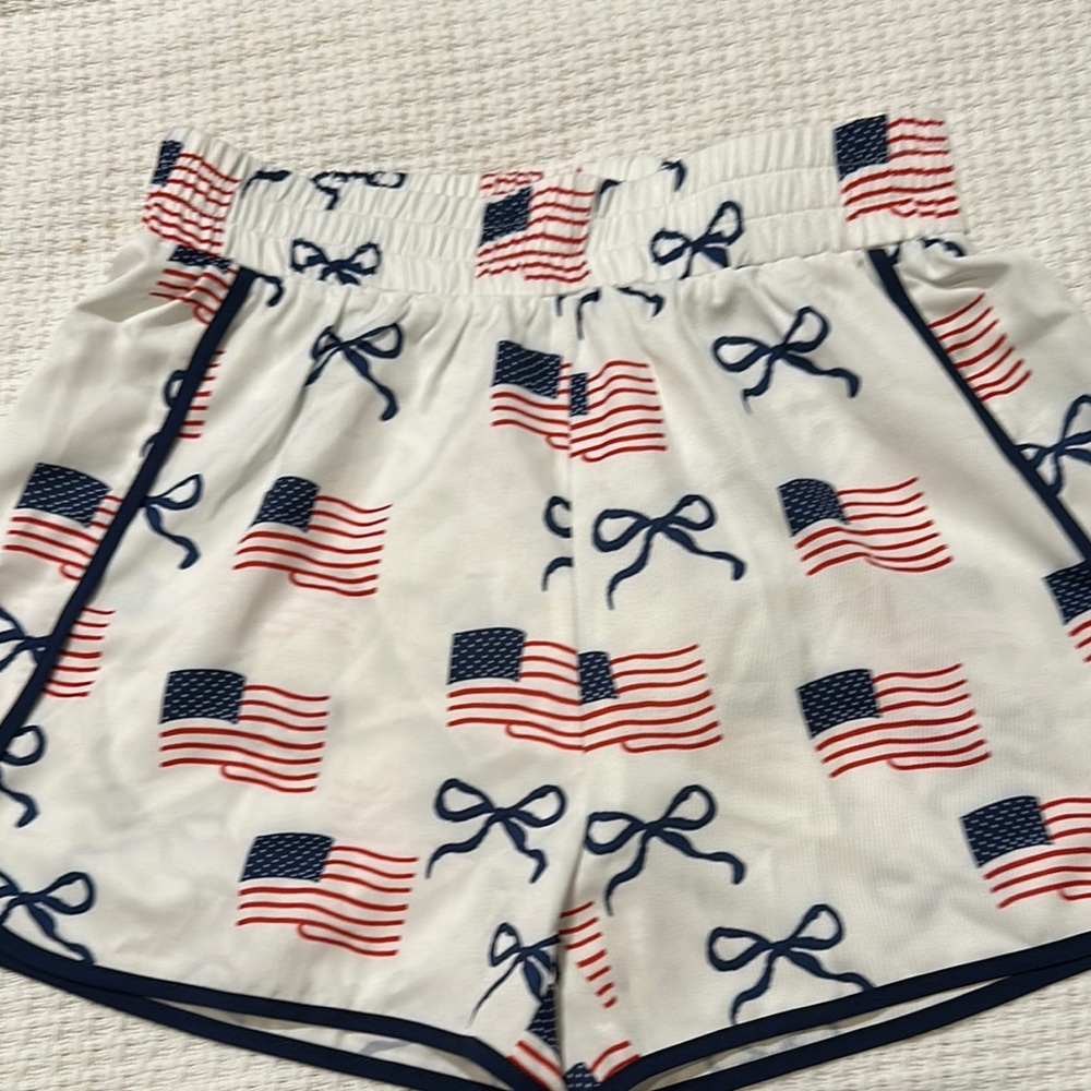 Pink Lily White Athletic Shorts with Red & Navy Flag Print
